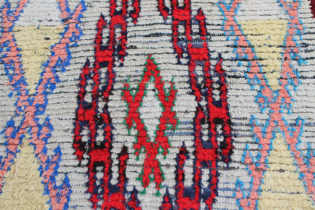1016 High Atlas with tan/red/blue/salmon red/salmon diamonds Pattern