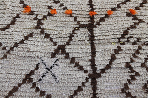 HighAtlas with cream brown diamonds/zig-zags w orange dots Pattern