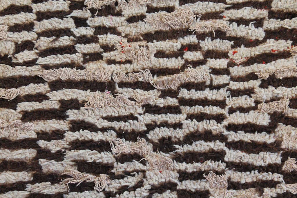 1051 HighAtlas with tan/brown/blue small square pattern Pattern