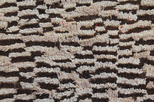 1051 HighAtlas with tan/brown/blue small square pattern Pattern