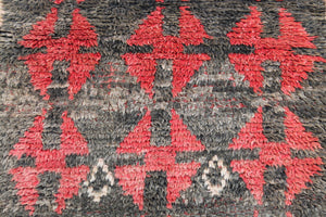 1053 Boujad with black w red X's and tan border Pattern