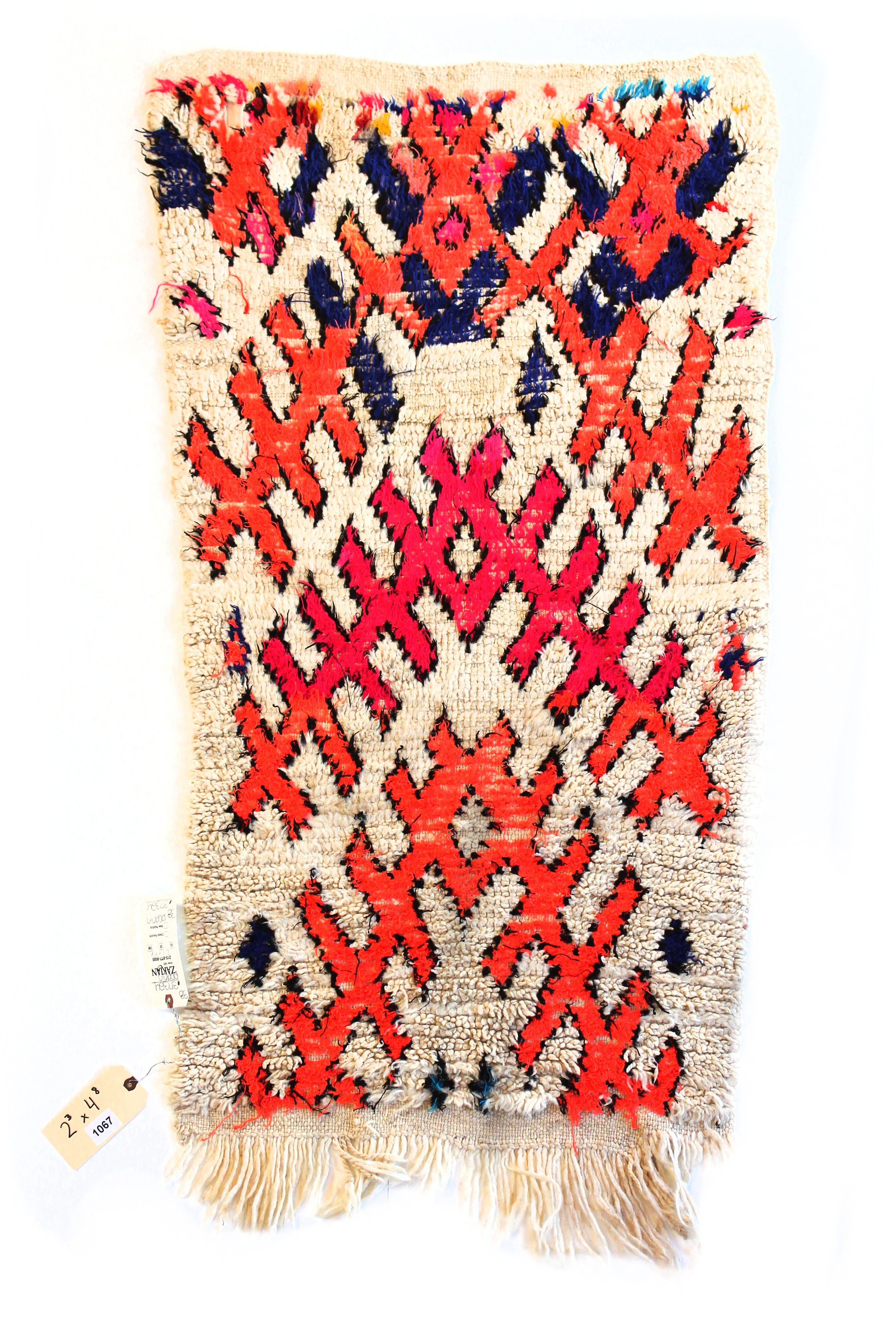 1067 HighAtlas with Taupe/Orange/Fusia/Blue Crossed X's Pattern