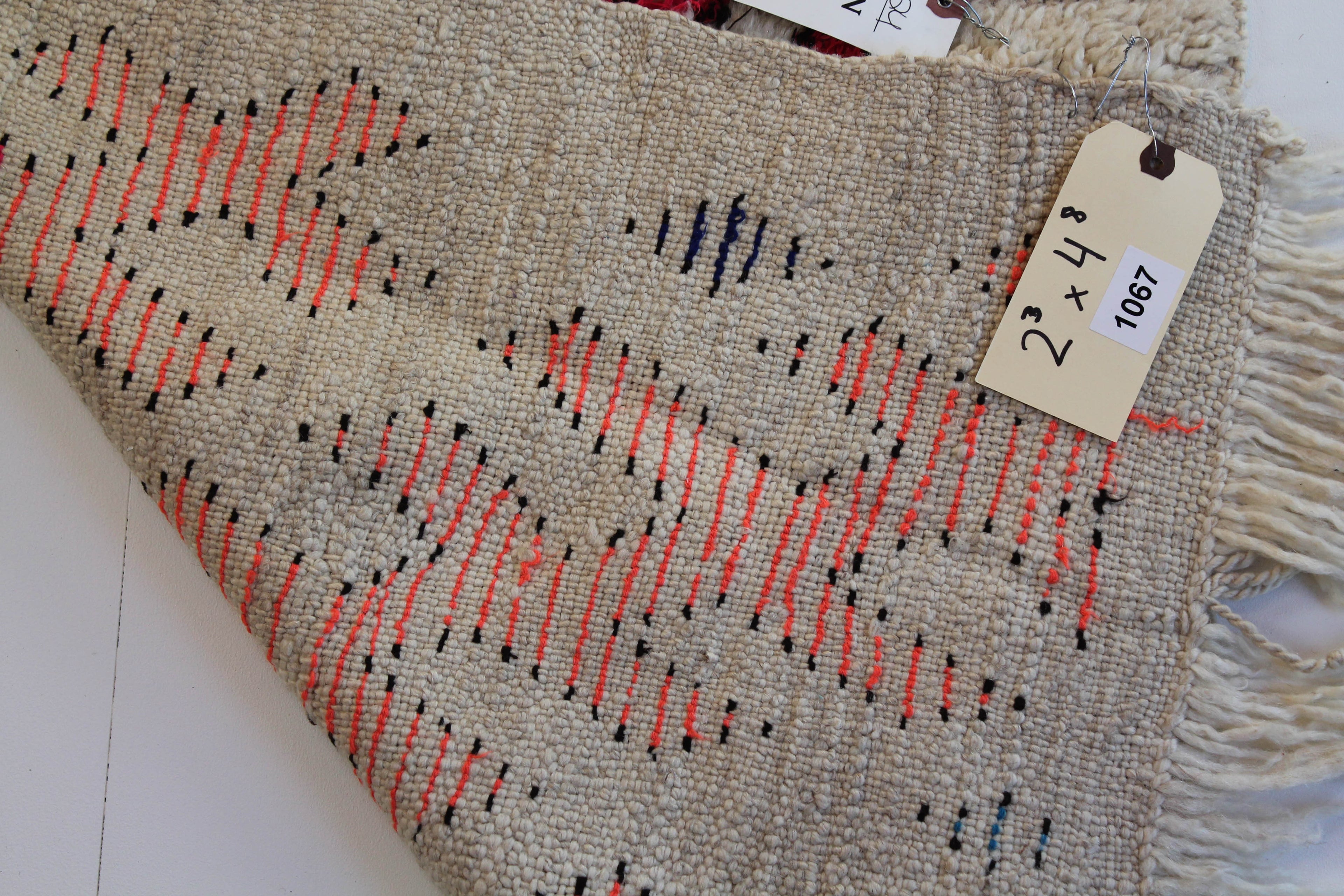 1067 HighAtlas with Taupe/Orange/Fusia/Blue Crossed X's Pattern