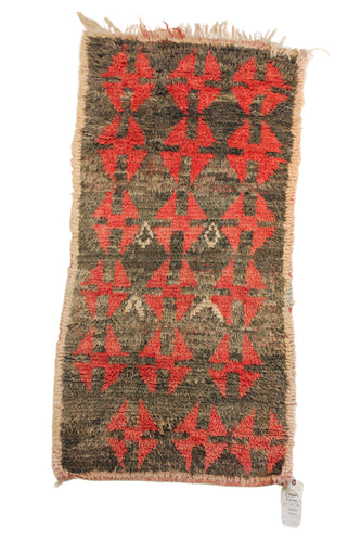 1053 Boujad with black w red X's and tan border Pattern