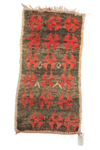 1053 Boujad with black w red X's and tan border Pattern